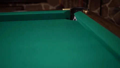Direct hit into the pocket in a corner of a green billiards table Stock Footage 72572864