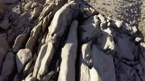 A direct look down aerial on a strange rock formation. 動画素材 155675891