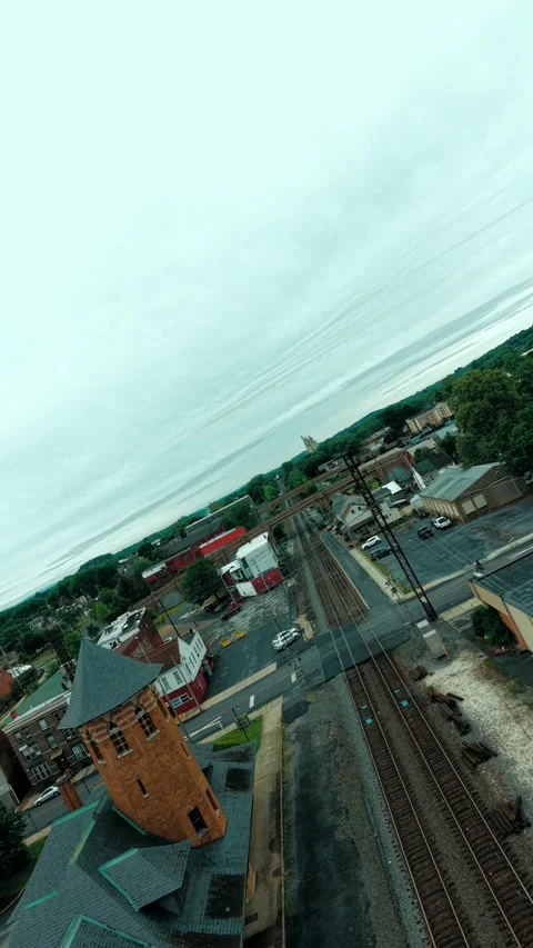 Direct overhead drone shot looking down at freight train containers tracking Stock Footage 336307482