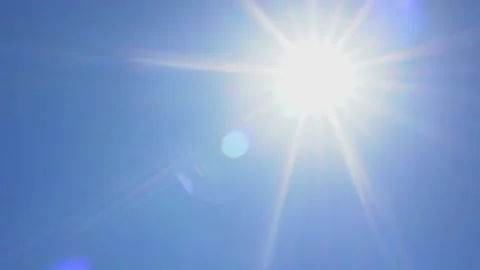 Direct ray of the sun in the blue sky Stock Footage 159387150