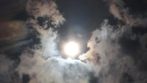 Direct Shot Of The SUN with slow clouds moving #1 Stock Footage 7731607