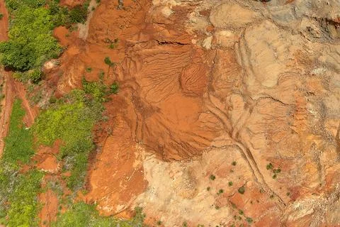 Direct top-down aerial view of barren soil fissures and complex surface tex.. Stock Photos