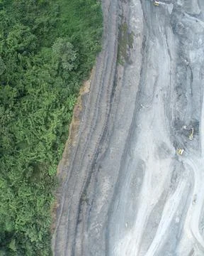 Direct top-down vertical aerial view of an active mining site Stock Photos