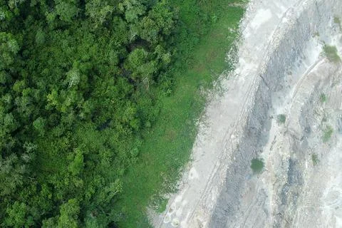 Direct top-down vertical aerial view showing the stark contrast between a d.. Stock Photos