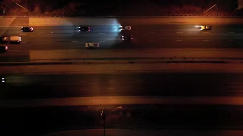 Direct view from above to the road traffic at night Stock Footage 248115181
