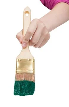 Direct view of painter hand with green paintbrush Stock Photos