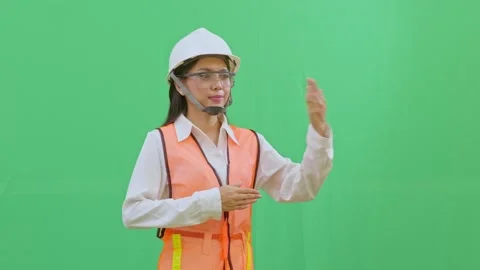 Directing Project Traffic Hand Signals for Machinery Female Worker Stock Footage 331864627