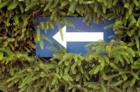 Direction arrow points in one way Stock Photos