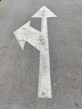 Direction Arrow on the Road Stock Photos