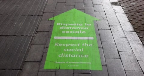 Direction arrow sign with information on train station about keeping distance Stock Footage 150155133