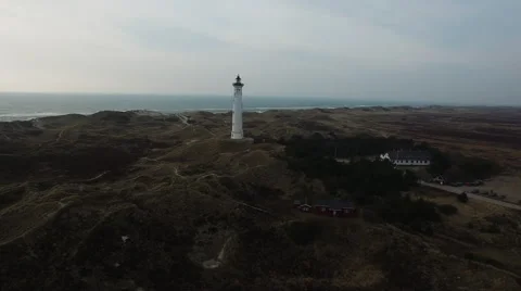 Direction: An old lighthouse showing the way at the Danish west coast 스톡 동영상 65152646