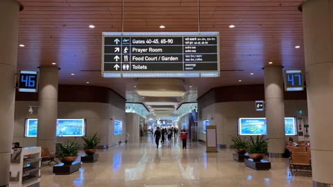 A direction sign board at Terminal 2, Mumbai International Airport. Stock Footage 314020771