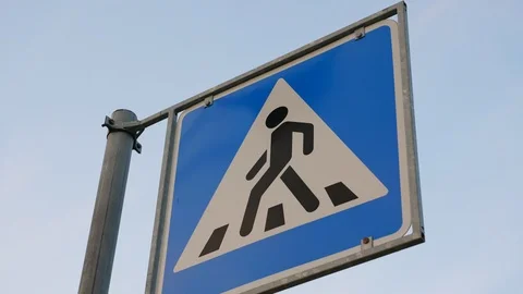 Direction sign pedestrian crossing quickly move away Stock Footage 91102786