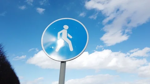 Direction sign pedestrian crossing quickly move away Stock Footage 104567414