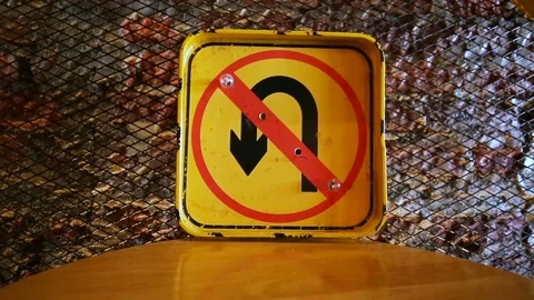 Direction sign on a square shaped metal placed on a restaurant table Stock Footage 84919608