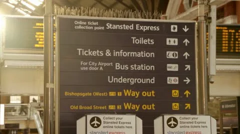 Direction signs at London Liverpool Street Station Stock Footage