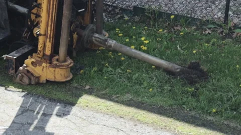Directional Drilling Machine Driving Bit Into Ground for Street Lighting Video stock 345096726