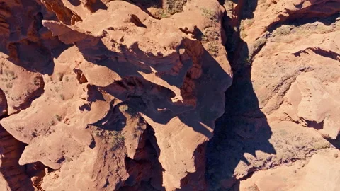 Directly above aerial view of dramatic canyon formations in Kyrgyzstan Stock Footage 330974995