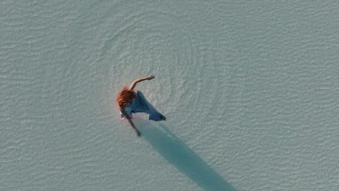 Directly above a dancer in salt flats Stock Footage 271034409