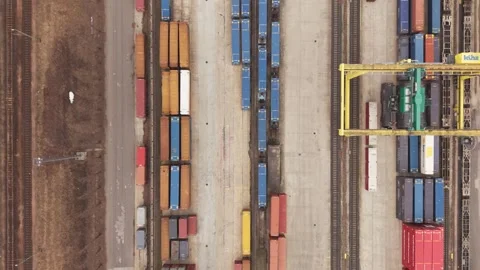 Directly above drone view of an intermodal freight terminal with neatly Stock Footage 331612859