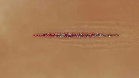 Directly above Long Tail Boat and people Practicing Stock Footage 247465342