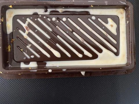 Directly above shoot of a pudding container that had been eaten left its vla Foto stock