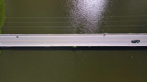 Directly above view of a bridge crossing an irrigation canal Stock Footage 282472049