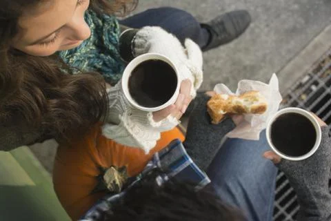 Directly above view of couple drinking coffee Fotos Stock