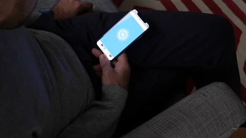 Directly above view of male using Shazam application that can identify music, 스톡 동영상 170249495