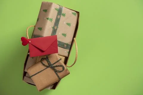 Directly above view with a red envelope clipped on the handle from a paper bag Photos