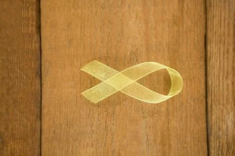 Directly above view of yellow Sarcoma Awareness ribbon Stock Photos