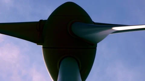 Directly Below on a Wind Turbine Against Blue Sky Stock Footage 293673376