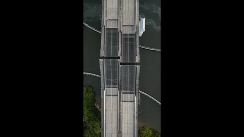 Directly overhead aerial view of double-leaf bascule drawbridge Video stock 327672301