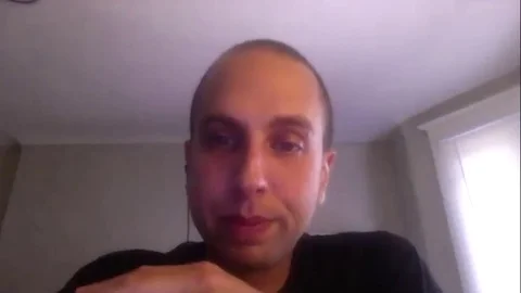 Director Brandon Cronenberg is interviewed online for movie Possessor - 2020 Stock Footage 144639752