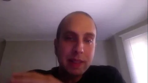 Director Brandon Cronenberg is interviewed online for movie Possessor - 2020 Stock Footage 144639772