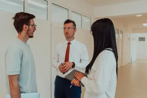 The director conducts a conversation with the Stock Photos