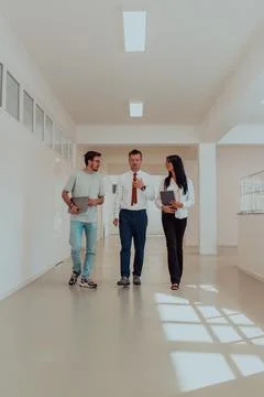 The director conducts a conversation with the Stock Photos