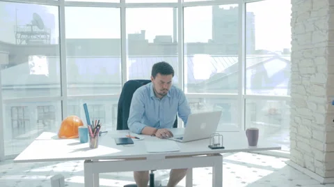 Director discuss project with employee, gives advice, using digital tablet in Stock Footage