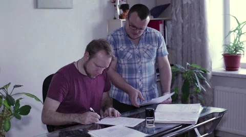 Director signs the document and puts a stamp Stock Footage 59581036