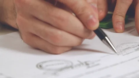 The Director signs the documents Stock-Footage 72035122