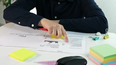 The director studies the fine received Stock Footage 312282504