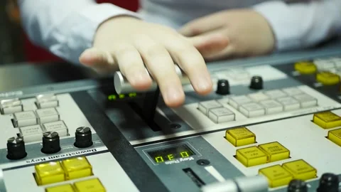 The director uses a mixing console Stock Footage 139384493