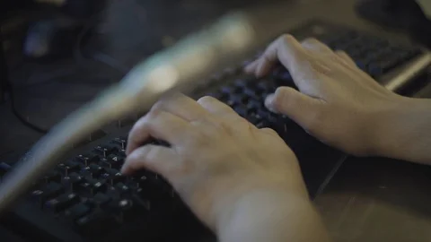 Director's microphone in studio control room. typing on keyboard in background. Stock Footage 102497835