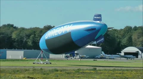 DIRECTV Blimp anchored to field Video stock 17148767