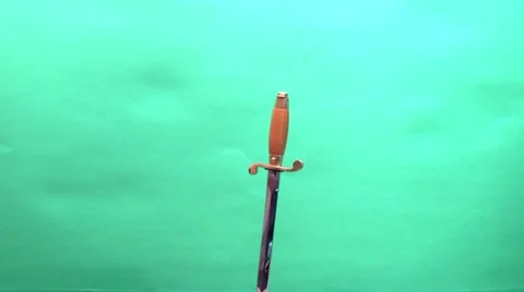 Dirk stuck to the subject on a green background Stock Footage 978680