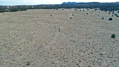 Dirt biker in the desert Stock Footage 94110449