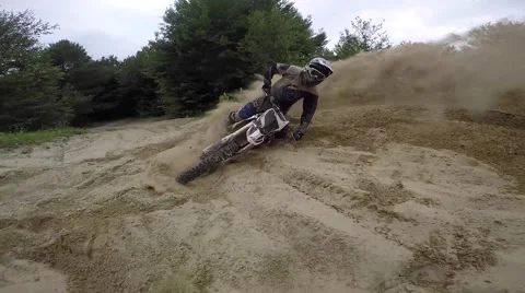 Dirt biker falls in corner Stock Footage 52146747