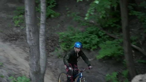 Dirt riding with tricks in the forest slow motion Stock Footage 77225611