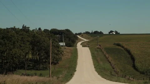 Dirt road and farmland, Iowa, USA Stock Footage