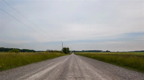 Dirt Road in between 2 Fields 1920x1080 24p 80mbps 5D MIII 14bit Raw Stock-Footage 24839946
